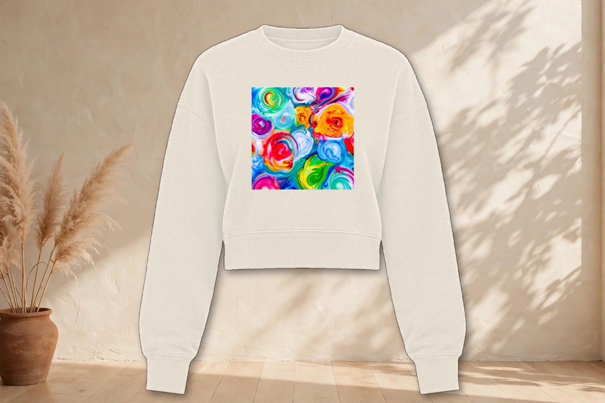 Flower Power cropped crewneck in cream, styled in a boho studio setting