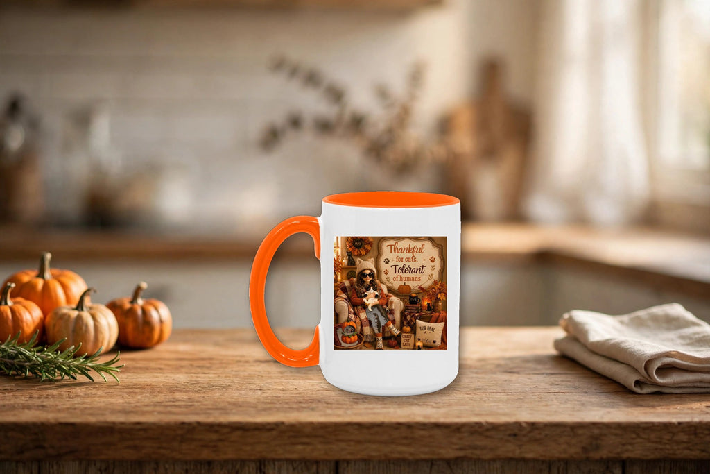 Thankful for Cats, Tolerant of Humans mug styled on a cozy kitchen counter